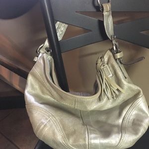 Stressed leather coach bag